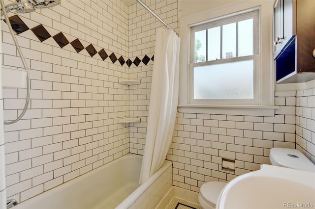 2636 N Glencoe St, Denver, CO 80207 - bathroom featuring tile walls, toilet, and tiled shower / bath combo