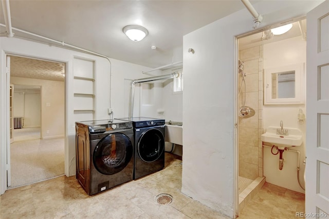 2636 N Glencoe St, Denver, CO 80207 - washroom featuring washer and dryer and radiator heating unit