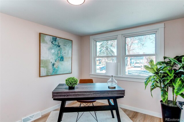1969 Uinta St, Denver, CO 80220 - office area with baseboards and light wood finished floors