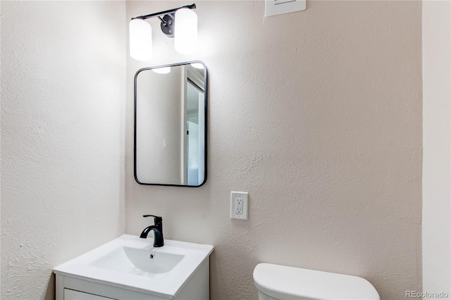 1969 Uinta St, Denver, CO 80220 - half bathroom with vanity and toilet
