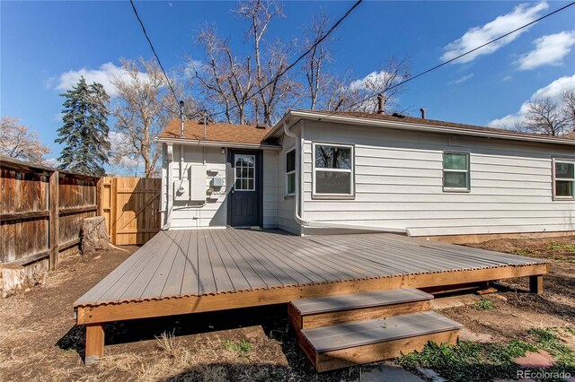 1969 Uinta St, Denver, CO 80220 - back of house featuring a deck and a gate