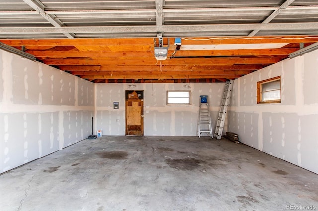 1969 Uinta St, Denver, CO 80220 - garage featuring a garage door opener