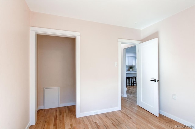 1969 Uinta St, Denver, CO 80220 - unfurnished bedroom featuring light wood-type flooring and baseboards