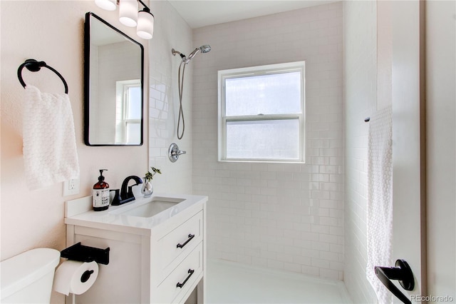 1969 Uinta St, Denver, CO 80220 - full bath featuring a tile shower and vanity