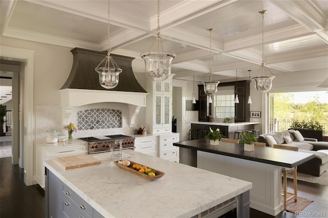 5470 S Highline Cir, Greenwood Village, CO 80121 - kitchen featuring a center island, a chandelier, dark wood-type flooring, coffered ceiling, and beam ceiling