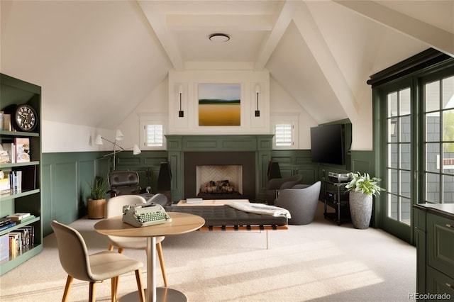 5470 S Highline Cir, Greenwood Village, CO 80121 - sitting room featuring a decorative wall, carpet floors, a wainscoted wall, lofted ceiling, and a fireplace with raised hearth