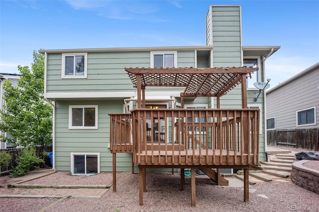 2035 Springcrest Rd, Colorado Springs, CO 80920 - rear view of property with a chimney and a deck