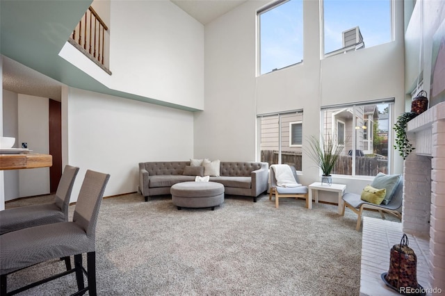 2035 Springcrest Rd, Colorado Springs, CO 80920 - carpeted living room featuring a high ceiling
