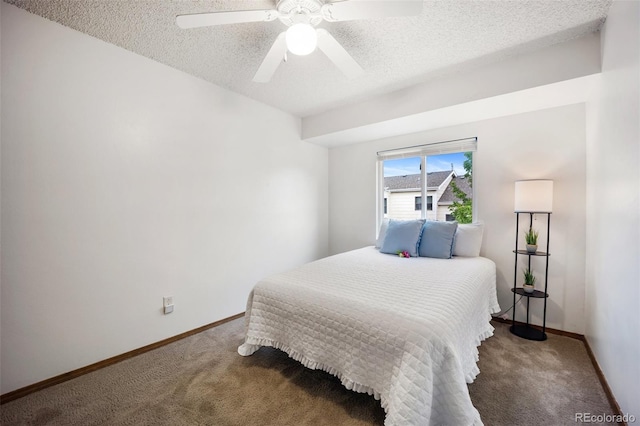 2035 Springcrest Rd, Colorado Springs, CO 80920 - bedroom with a textured ceiling, carpet floors, and ceiling fan