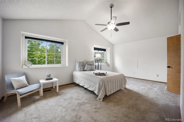 2035 Springcrest Rd, Colorado Springs, CO 80920 - carpeted bedroom with multiple windows, lofted ceiling, a textured ceiling, and ceiling fan