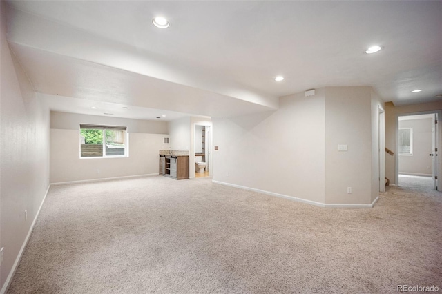 2035 Springcrest Rd, Colorado Springs, CO 80920 - unfurnished living room with light colored carpet and recessed lighting