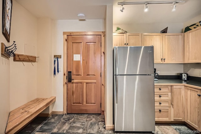 100 Dercum Sq Unit 8343, Keystone, CO 80435 - kitchen with freestanding refrigerator, light brown cabinets, and baseboards