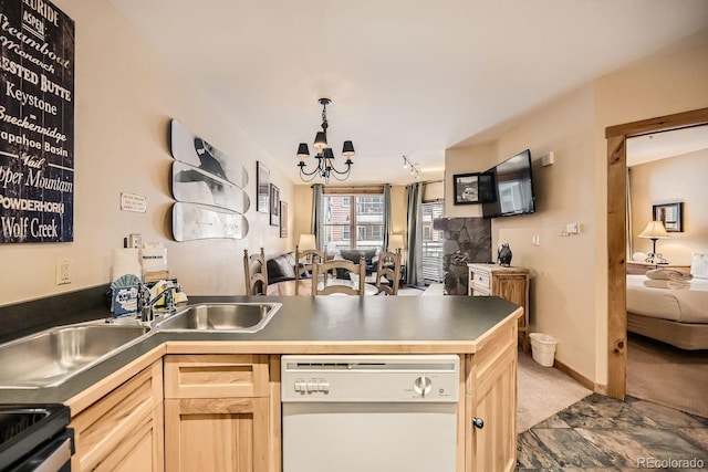 100 Dercum Sq Unit 8343, Keystone, CO 80435 - kitchen with white dishwasher, light brown cabinets, a peninsula, and open floor plan