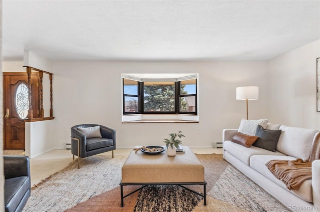 carpeted living area featuring baseboards and a baseboard radiator