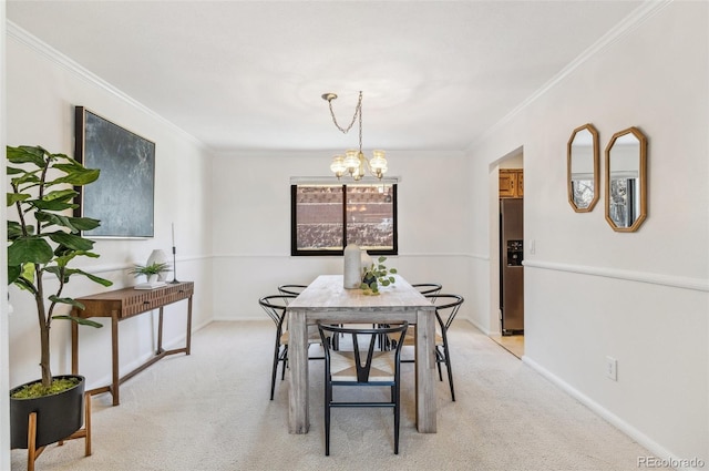 dining room featuring baseboards, light carpet, an inviting chandelier, and crown molding