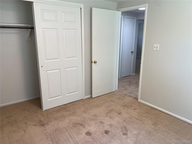 3760 Owens St, Wheat Ridge, CO 80033 - unfurnished bedroom featuring carpet floors, baseboards, and a closet