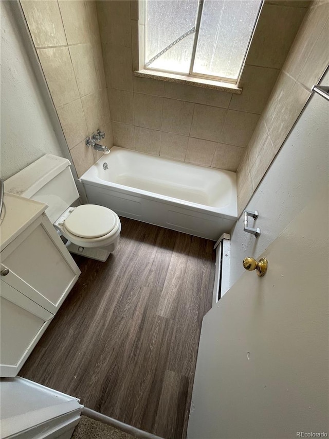3760 Owens St, Wheat Ridge, CO 80033 - bathroom with toilet and wood finished floors