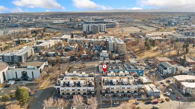 birds eye view of property with a city view