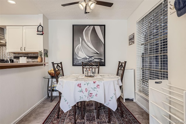 dining area with recessed lighting, a textured ceiling, baseboards, carpet flooring, and ceiling fan