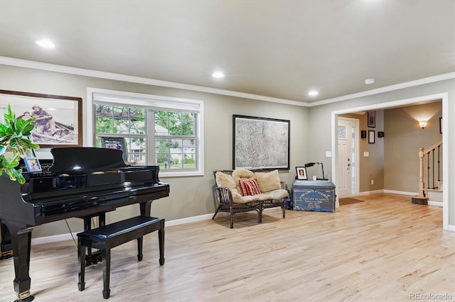 5755 S Fulton Way, Greenwood Village, CO 80111 - living area featuring crown molding, light wood finished floors, stairs, and recessed lighting