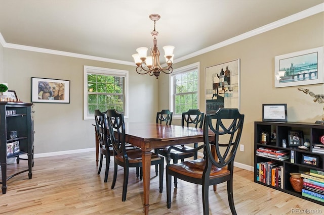 5755 S Fulton Way, Greenwood Village, CO 80111 - dining area with a chandelier, light wood-style floors, and crown molding