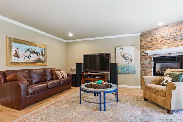 5755 S Fulton Way, Greenwood Village, CO 80111 - living area with wood finished floors, ornamental molding, a stone fireplace, and recessed lighting