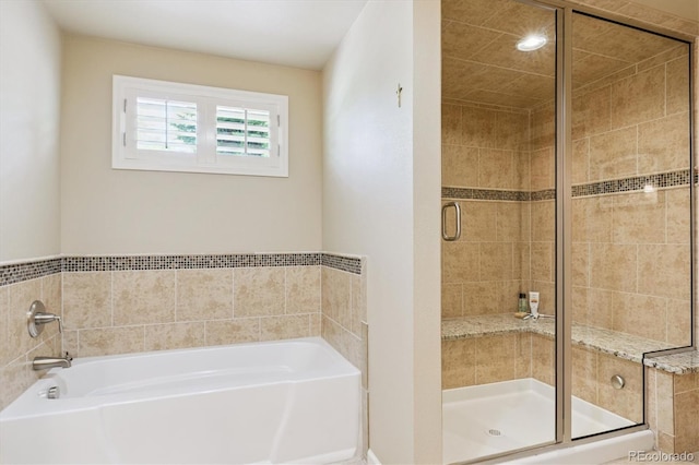 5755 S Fulton Way, Greenwood Village, CO 80111 - full bathroom featuring a garden tub and a shower stall