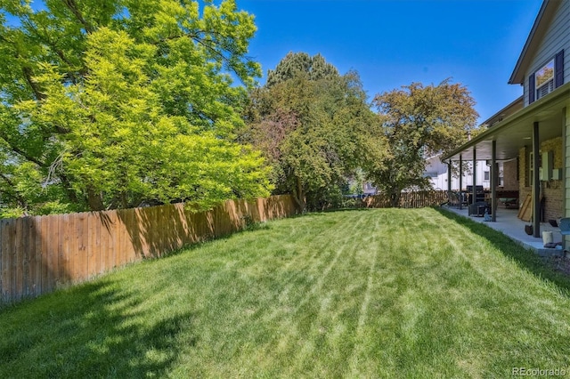 5755 S Fulton Way, Greenwood Village, CO 80111 - fenced backyard featuring a patio area
