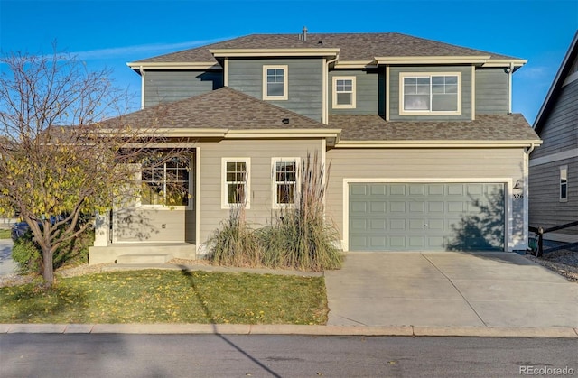 326 Kalkaska Ct, Fort Collins, CO 80524 - view of front facade with concrete driveway, a garage, and a shingled roof