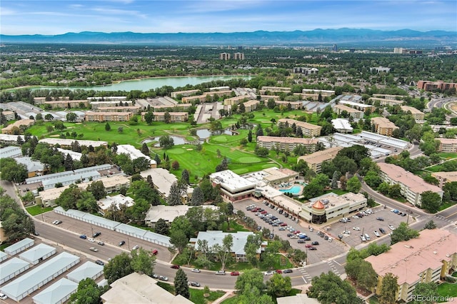 bird's eye view with a water and mountain view