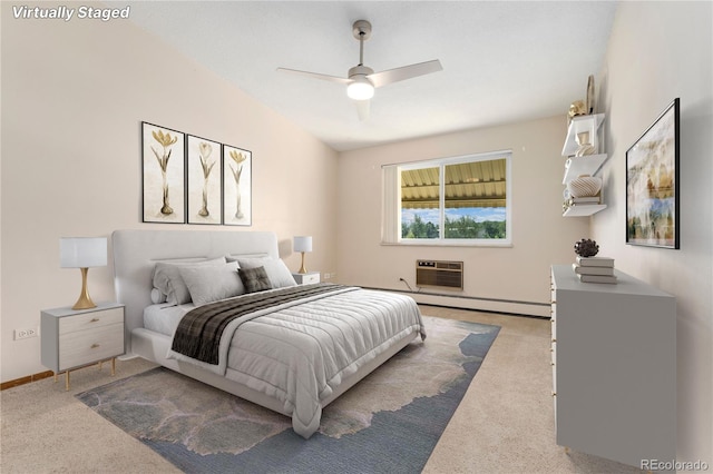 carpeted bedroom with baseboard heating, a wall mounted AC, and ceiling fan