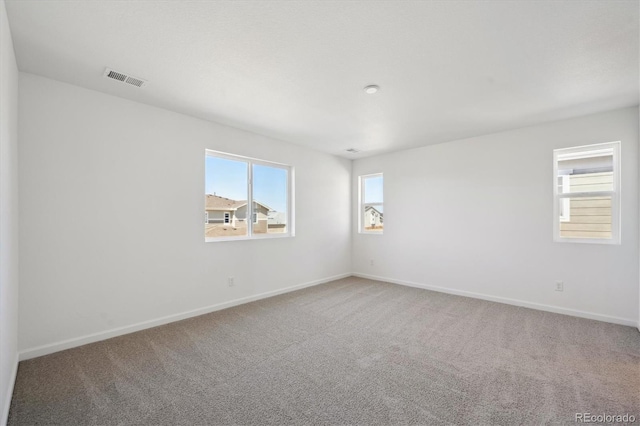 1331 Rock Cliff Ave, Erie, CO 80516 - spare room with carpet flooring, baseboards, and visible vents