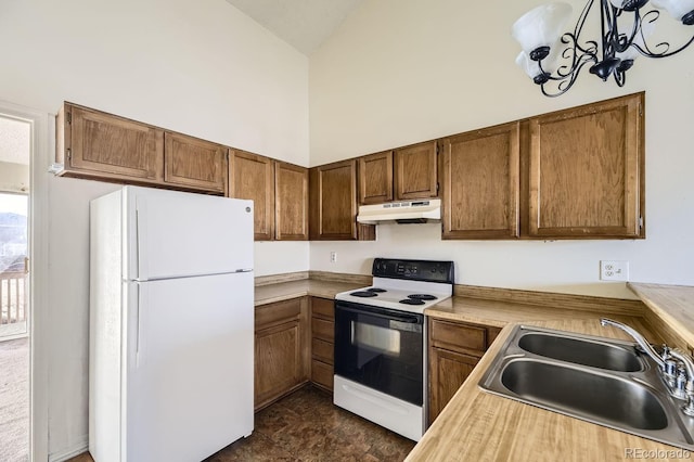 kitchen with white appliances, light countertops, under cabinet range hood, high vaulted ceiling, and a sink