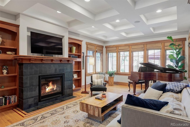 1143 S Saint Paul St, Denver, CO 80210 - living room featuring a fireplace, healthy amount of natural light, wood finished floors, recessed lighting, and beamed ceiling