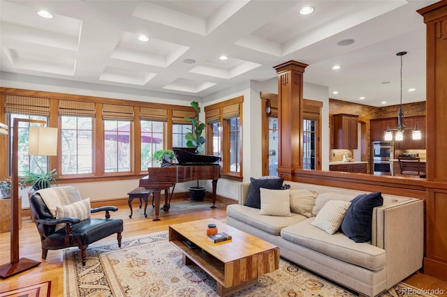 1143 S Saint Paul St, Denver, CO 80210 - living room with recessed lighting, baseboards, light wood-style flooring, coffered ceiling, and decorative columns