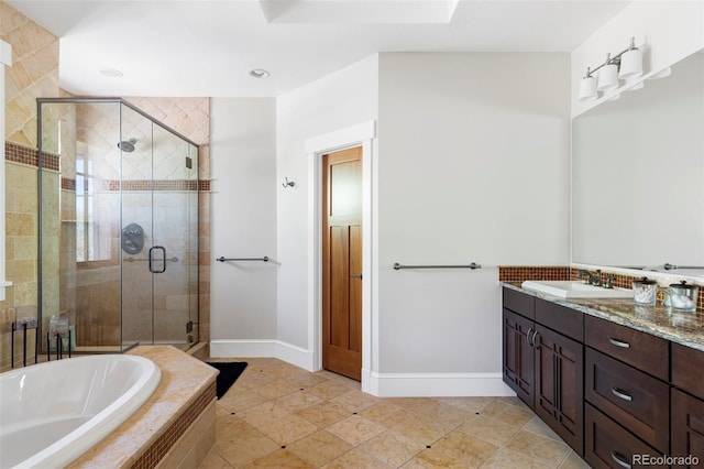 1143 S Saint Paul St, Denver, CO 80210 - full bathroom with a stall shower, baseboards, a bath, vanity, and recessed lighting
