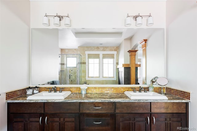 1143 S Saint Paul St, Denver, CO 80210 - bathroom with a stall shower, a raised ceiling, double vanity, and backsplash