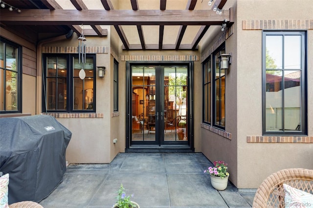 1143 S Saint Paul St, Denver, CO 80210 - doorway to property featuring french doors and stucco siding