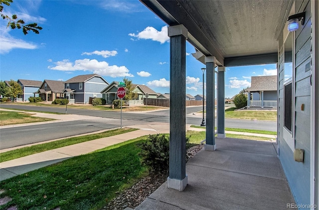 view of patio with a porch and a residential view