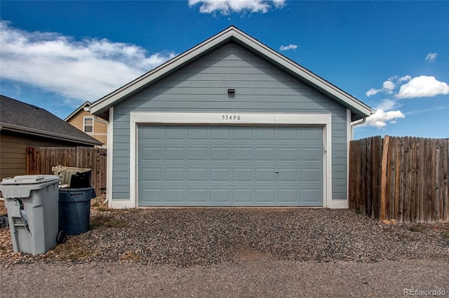 detached garage with fence