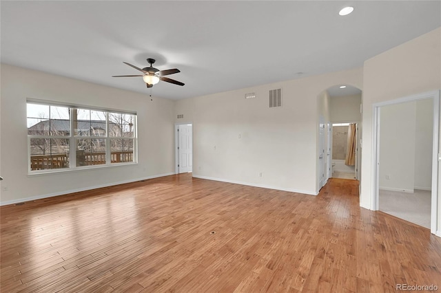 empty room featuring ceiling fan and light wood-type flooring