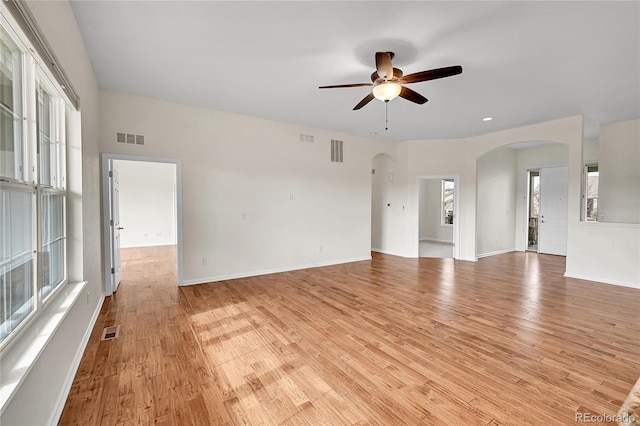 unfurnished room with ceiling fan and light hardwood / wood-style flooring