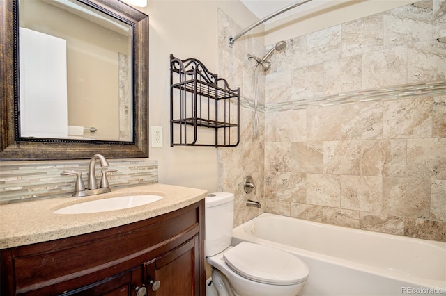 969 Pulpit Rock Ct, Colorado Springs, CO 80918 - full bath with toilet, vanity, shower / tub combination, and decorative backsplash