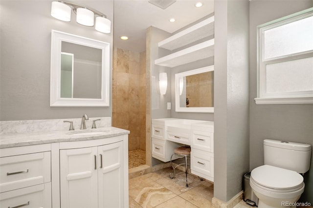 969 Pulpit Rock Ct, Colorado Springs, CO 80918 - bathroom featuring vanity, a walk in shower, recessed lighting, and toilet