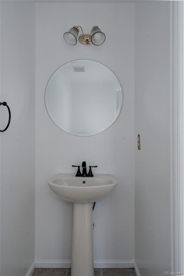 bathroom featuring baseboards