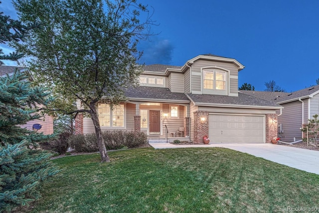traditional home with a front yard, roof with shingles, brick siding, concrete driveway, and an attached garage