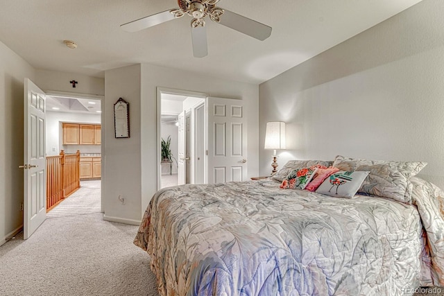 bedroom with baseboards, ceiling fan, and light carpet