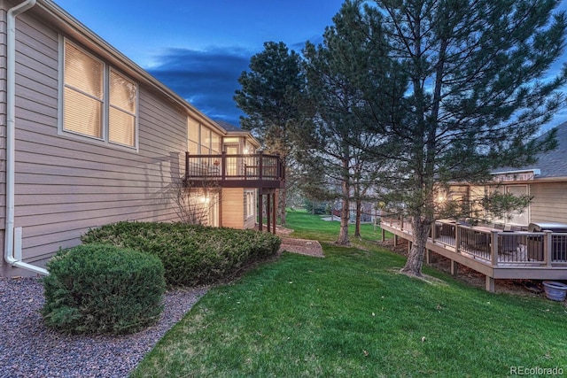 view of yard with a wooden deck