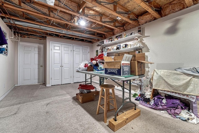 basement featuring carpet flooring