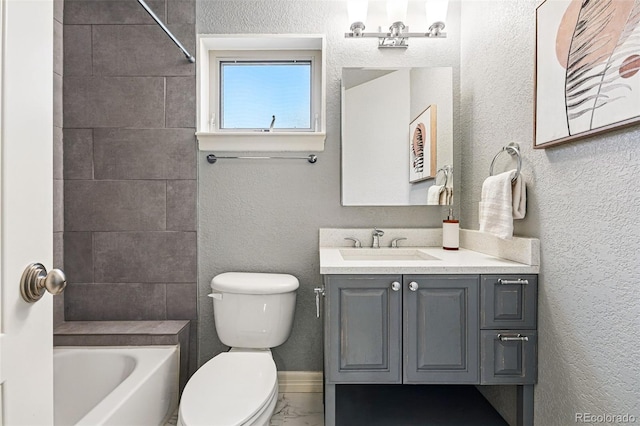 2319 Decatur St, Denver, CO 80211 - full bath featuring vanity, bathtub / shower combination, marble finish flooring, and a textured wall